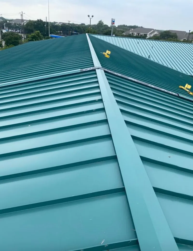 Green commercial metal roof ridge and valley for Metal Roof Repair in Cherry Hills Village