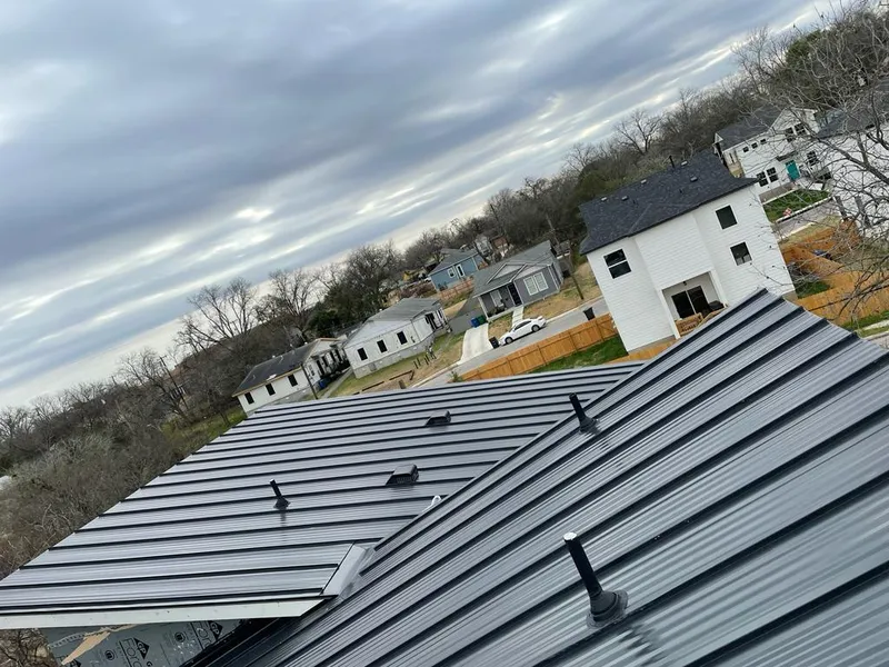 Standing seam metal roof panels with vents for Skylight Repair in Cherry Hills Village